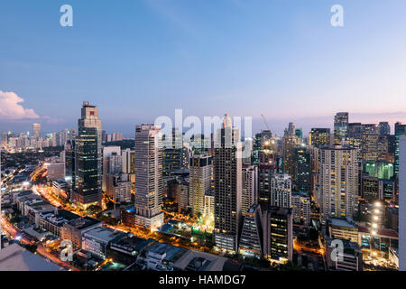 Makati Skyline at night. Makati is a city in the Philippines` Metro Manila region and the country`s financial hub. Stock Photo